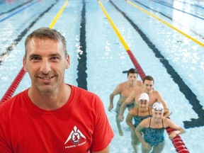 Coach Martin Gingras of Pointe Claire Swimming Club with four hopefuls at Summer Nationals at the Malcolm Knox Aquatic Centre, July 17 to 20, 2013.