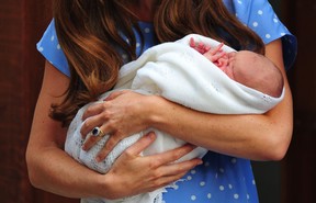 A file picture taken on July 23, 2013, shows Catherine, Duchess of Cambridge, holding her new baby son. Britain's Prince William and his wife Kate have named their new baby boy George Alexander Louis, Kensington Palace announced on Wednesday July 24, 2013. The baby will be known as His Royal Highness Prince George of Cambridge.   AFP PHOTO / CARL COURT/FILESCARL COURT/AFP/Getty Images