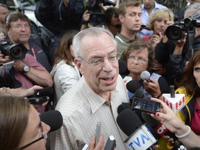 Rail World Inc. president Edward Burkhardt speaks to the media as he tours Lac-Megantic, Que. on Wednesday. Burkhardt told reporters the engineer last in charge of the train that eventually careened unmanned into the Eastern Townships town, killing at least 15 and leaving more than 40 missing, has been suspended. Provincial police are now treating the disaster site as a crime scene. THE CANADIAN PRESS/Ryan Remiorz