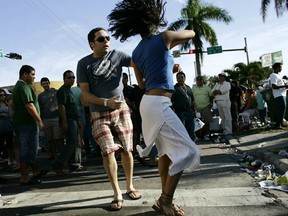 I'm just using  this as a generic dancing photo, though the  people are dancing to  salsa music, at  the Calle Ocho celebration Miami, Florida.  (Photo by Joe Raedle/Getty Images)