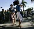 I'm just using  this as a generic dancing photo, though the  people are dancing to  salsa music, at  the Calle Ocho celebration Miami, Florida.  (Photo by Joe Raedle/Getty Images)