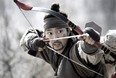 Skilled archer Nam-yi (Park Hae-il) is determined to rescue his sister after she is kidnapped by invaders, in the Korean film War of the Arrows.