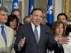 Coalition Avenir Quebec Leader Francois Legault, pictured in this file picture from last June, said today the PQ's charter of Quebec values is "too radical." But Legault made it clear that he, too, favours banning visible signs of religious affiliation within certain areas of the Quebec civil service. THE CANADIAN PRESS/Jacques Boissinot