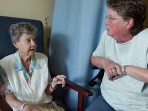 Ninety year-old Margaret Edwards, left, speaks to her daughter Diane Clark .