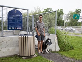 Kevin Bushell and his dog Digby at the dog run on Ovide Ave. in Pointe-Claire.
