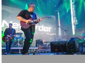 English rock band New Order performs at the 2013 Osheaga Music Festival at Jean-Drapeau Park in Montreal on Sunday, August 4, 2013.