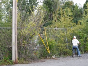 A man looks into the Reliance yard.