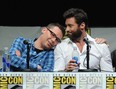 Eat your hearts out, ladies! Director Bryan Singer, left, rests his head on  actor Hugh Jackman's shoulder at  Comic-Con International 2013 at San Diego Convention Center on July 20, 2013 in San Diego, California.  (Photo by Kevin Winter/Getty Images)