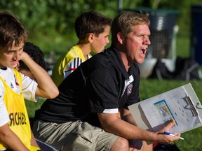 Dean Weldon on the sidelines during a game in Beaconsfield.