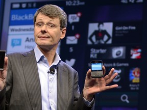 This January 30, 2013 file photo shows Research in Motion CEO Thorsten Heins as he officially unveils the BlackBerry 10 mobile platform at the New York City Launch at Pier 36. Canadian tech pioneer BlackBerry, which earlier this week agreed to a $4.7 billion buyout, said today that it lost $965 million in the second quarter. The Ontario-based company, formerly a leader in mobile phone technology, has been squeezed by rivals Android and Apple, steadily losing market share, a trend which continues according to its latest earnings report.  AFP PHOTO / TIMOTHY A. CLARY / FILESTIMOTHY A. CLARY/AFP/Getty Images