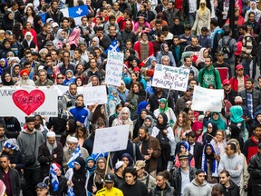 Protesters take part in a demonstration last weekend opposing the proposed Charter of Quebec Values by the Parti Quebecois government led by Pauline Marois. An exclusive survey conducted for The Gazette finds that despite such opposition, Quebec's support for the charter remains strong. (Dario Ayala / THE GAZETTE)