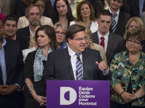 Denis Coderre surrounded by candidates at official launch of election campaign, Friday September 20, 2013.