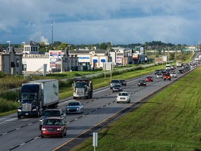Traffic slows on Autoroute 40 in Vaudreuil-Dorion during the morning rush.
