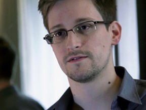 A Sunday, June 9, 2013, file photo provided by The Guardian newspaper in London shows Edward Snowden, who worked as a contract employee at the U.S. National Security Agency, in Hong Kong.
