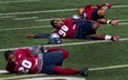 Als' cornerback Byron Parker (20) hopes he'll be able to stretch like this before Sunday's game at Vancouver.
Allen McInnis/The Gazette