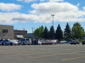 Police gathered in parking lot across from Fairview prepared to provide backup on Monday morning.