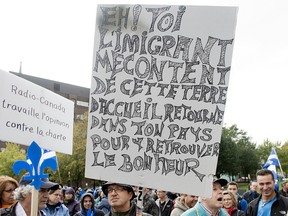 Supporters of a proposed Quebec values charter gathered in Montreal last Sunday to demonstrate in support of the charter which would ban the wearing of religious symbols and clothing from any public institutions if brought into law. THE CANADIAN PRESS/Graham Hughes
