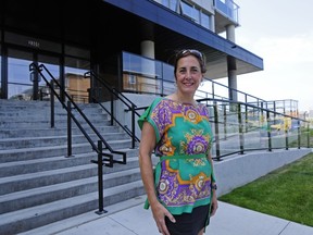 Sales representative Vittoria Tassone stands in front of the affordable-housing project Le VersO, in Lachine. (Navneet Pall/THE GAZETTE)