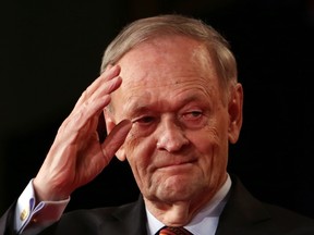 Former prime minister Jean Chretien salutes after addressing the Liberal Party leadership in Ottawa, Sunday April 14, 2013. Chretien this week said the PQ's proposed charter of Quebec values would have to conform to the Canadian Charter of Rights and Freedoms. THE CANADIAN PRESS/Fred Chartrand