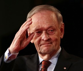 Former prime minister Jean Chretien salutes after addressing the Liberal Party leadership in Ottawa, Sunday April 14, 2013. Chretien this week said the PQ's proposed charter of Quebec values would have to conform to the Canadian Charter of Rights and Freedoms. THE CANADIAN PRESS/Fred Chartrand