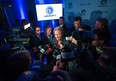 Quebec Premier Pauline Marois speaks with reporters after a press conference to announce Ubisoft's $375 million expansion project at the new company studio in downtown Montreal on Monday, September 30, 2013.