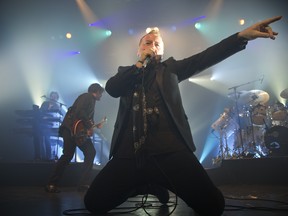 Jim Kerr of Simple Minds performs at Metropolis on Monday, Oct. 21, 2013. (Vincenzo D'Alto / THE GAZETTE)