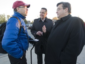Pierrefonds-Roxboro mayoral incumbent Jim Beis, centre, and Montreal mayoral candidate Denis Coderre.