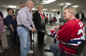 Residents of Le Cambridge seniors residence in Pointe Claire line up for autographs and to meet Nilan on Friday, Nov. 15.