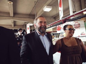 NDP leader Thomas Mulcair has been campaigning hard for candidate Stephane Moraille (R) ahead of the Nov. 25 federal by-election in Montreal's riding of Bourassa (Photo courtesy Stephane Moraille, via Facebook)
