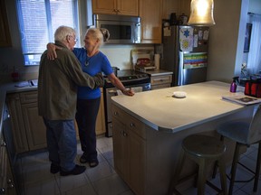 Care worker Marielle Tremblay and elderly resident Kenneth McLachlan at Résidence du Belvédère in Pierrefonds on  Montreal's west end Wednesday November 20, 2013.