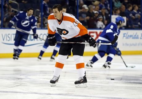 Former Tampa Bay Lightning center Vincent Lecavalier with his wife  Caroline, and his children Amelia, Gabriet, and Victoria, during his jersey  retirement ceremony before an NHL hockey game against the Los Angeles