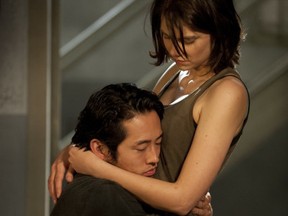 Walking Dead stars Steven Yeun and Lauren Cohan, courtesy of AMC