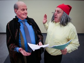 John Brennan, left, and Tom Rhymes as Scrooge rehearse for the Lester B. Pearson School Board's Dec. 7, 2013 production of A Christmas Carol at Lindsay Place High School.