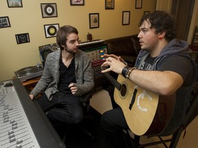 Producer Connor Seidel, pictured left, works with musician Patrick Di Meo in Baie-d'Urfé studio. (Marie-France Coallier/THE GAZETTE)