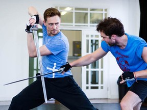 Tom Hiddleston, left, and Hadley Fraser rehearse a scene from the Donmar Warehouse presentation of the Shakespeare play Coriolanus. Photo from Donmar Warehouse web site.
