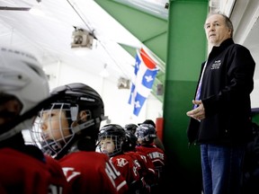 Roy Halpin behind the bench as his atom BB Royals take on the Lakeshore Tigers, Nov. 30.