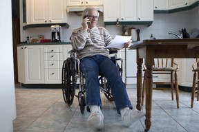 Dorval Mayor Edgar Rouleau attends to his civic duties - even with two broken heels.