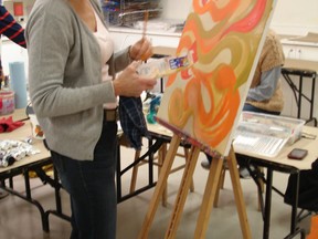 Woman and orange painting