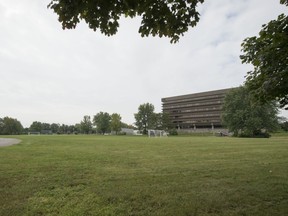 This land, once owned by Queen of Angels Academy, is slated for a condo/townhouse development. (Peter McCabe/THE GAZETTE)