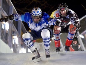 Finland's Lari Joutsenlathi (L) and Switzerland's Kim Mueller compete during the finals of the Ice Cross Downhill World Championship at the Red Bull Crashed Ice on March 2, 2013 in the old town of Lausanne, western Switzerland. 40,000 spectators watched the races.  AFP PHOTO / FABRICE COFFRINIFABRICE COFFRINI/AFP/Getty Images