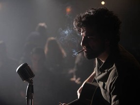 In a scene set in New York's Gaslight Café, Oscar Isaac plays folksinger Llweyn Davis. The smoke is nice from an artistic point of view, but I'm glad  that clubs are smoke-free these days. You?