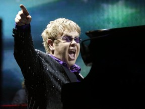 This June 30, 2012 photo shows British pop star Elton John performing during the Euro 2012 soccer championship in Kiev, Ukraine. (AP Photo/Efrem Lukatsky)