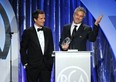 Producer David Heyman (L) and director-producer Alfonso Cuaron accept the Darryl F. Zanuck Award for Outstanding Producer of Theatrical Motion Pictures for 'Gravity' during the 25th annual Producers Guild of America Awards at The Beverly Hilton Hotel on January 19, 2014 in Beverly Hills, California.  (Kevin Winter/Getty Images)