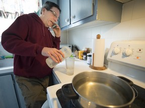 David Lynch boils water at his home in Vaudreuil-Dorion on Wednesday, January 8, 2014.