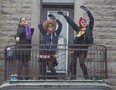 University of Montreal students Charlotte Zachary, left, Emmanuelle Beau, centre and Johanna Durget carry on their Saturday night party on Sunday morning  by dancing the morning away from the balcony of their St Denis street apartment on Sunday  January 19 2014. (Pierre Obendrauf / THE GAZETTE)