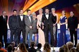 Actors Robert De Niro, left, Michael Pena, Alessandro Nivola, Jeremy Renner, Colleen Camp, Elisabeth Rohm, Bradley Cooper, Jennifer Lawrence, Amy Adams, and Paul Herman accept the Outstanding Performance by a Cast in a Motion Picture award for 'American Hustle'  during the 20th Annual Screen Actors Guild Awards at The Shrine Auditorium on January 18, 2014 in Los Angeles, California.  (Kevork Djansezian/Getty Images)