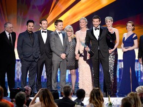 Actors Robert De Niro, left, Michael Pena, Alessandro Nivola, Jeremy Renner, Colleen Camp, Elisabeth Rohm, Bradley Cooper, Jennifer Lawrence, Amy Adams, and Paul Herman accept the Outstanding Performance by a Cast in a Motion Picture award for 'American Hustle'  during the 20th Annual Screen Actors Guild Awards at The Shrine Auditorium on January 18, 2014 in Los Angeles, California.  (Kevork Djansezian/Getty Images)