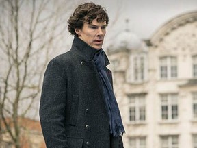 Benedict Cumberbatch as Sherlock Holmes, wearing his iconic coat.