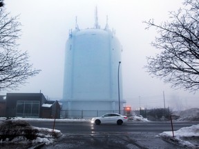 The telecommunications installation on the water tower on Oakwood St. will be removed. (John Kenney/THE GAZETTE)