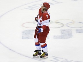 Russia forward Alexander Ovechkin skates off the ice after the 3-1 loss to Finland in the men's quarterfinal hockey game in Bolshoy Arena at the 2014 Winter Olympics, Wednesday, Feb. 19, 2014, in Sochi, Russia. (AP Photo/David J. Phillip )